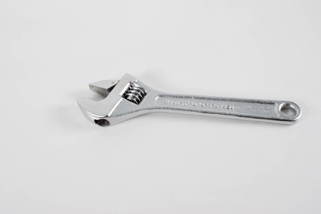 adjustable wrench on white background.の写真素材