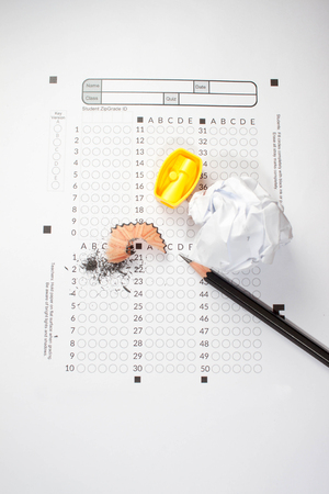black Pencils lying on a computerized exam answer sheet.の写真素材