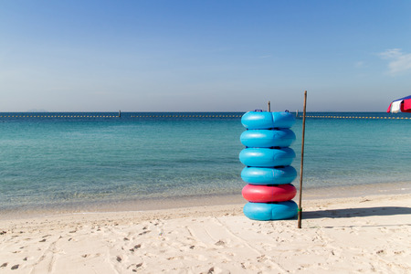 Stack of colorful swimming rings.の写真素材