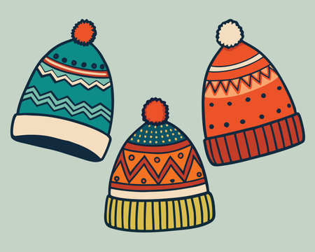 Winter clothes. Knitted hats. Vector illustration in flat style.のイラスト素材