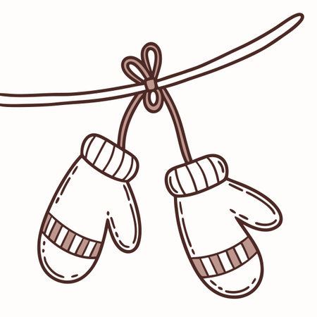 Vector illustration of a pair of knitted mittens hanging on a ropeのイラスト素材