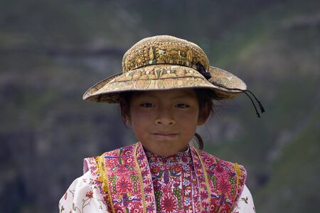Peru, Colca Valley, Village Chivay, 3d April 2010, Little girl on local marketのeditorial素材
