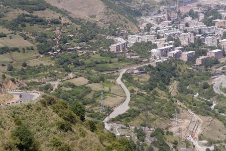 Kajaran city in Armenia, aerial view on city on valleyの写真素材