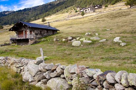 Small stony cottage, rural view in Pyrenees mountain - Andorra.の写真素材