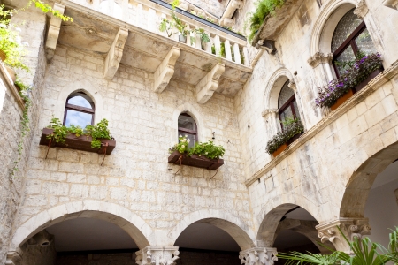 Courtyard of old tenement house - Trogir, Croatia の写真素材