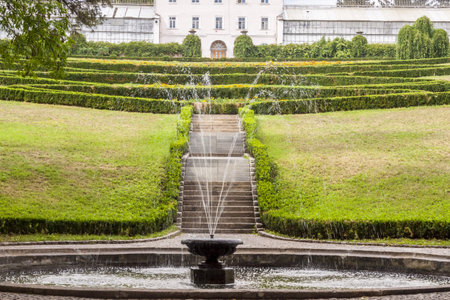 Small fountain in background hedgerow  Uman - Sofiyivsky park  Ukraine 