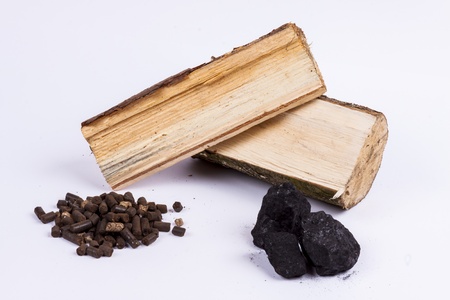 Timber, coal and biomass pellet on white background.の写真素材