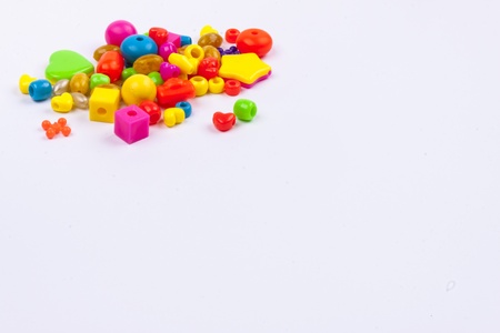 Colourful beads on white background.の写真素材