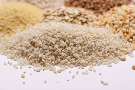 Couscous, rice, pea, grits, oatmeal, lentil - white background の写真素材