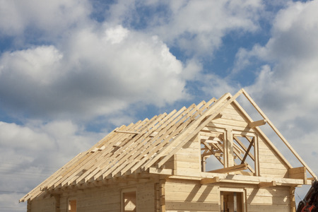Unfinished roof in wooden home.の写真素材