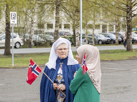 VERDAL, NORWAY - MAY 17, 2017: National day in Norway. Norwegians at traditional celebration and parade  on may 17, 2017 in Verdal. People on parde before school in Verdal. Constitution Day is the National Day of Norway and is an official national holidayのeditorial素材