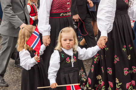 VERDAL, NORWAY - MAY 17, 2017: National day in Norway. Norwegians at traditional celebration and parade  on may 17, 2017 in Verdal. People on parde before school in Verdal. Constitution Day is the National Day of Norway.のeditorial素材