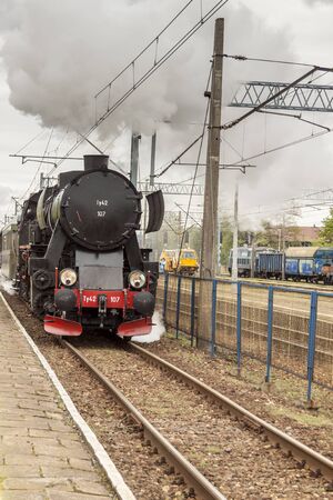 Kalety, Poland - May 13, 2019: Historic steam locomotive type Ty42-107 Kalety train station on may 13, 2019 in Kalety, Poland, Silesia.のeditorial素材