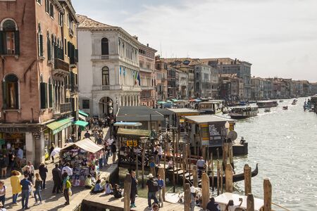 VENICE, ITALY -  MAY 2, 2019: Tourists visiting the old city of Venice on May 2,2019 in Venice in Italy. View on Grand Canal in Venice.のeditorial素材