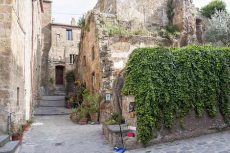 Bagnoregio, Italy - MAY 1, 2019: View on alley in  old town of  Bagnoregio on May 1,2019 in Bagnoregio, Tuscany, Italy.のeditorial素材