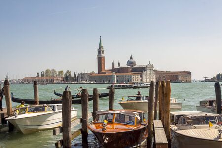 VENICE, ITALY -  MAY 2, 2019: Tourists visiting the old city of Venice on May 2,2019 in Venice in Italy. View on Grand Canal in Venice.のeditorial素材
