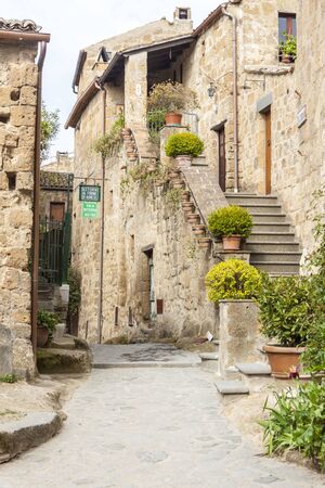 Bagnoregio, Italy - MAY 1, 2019: View on alley in  old town of  Bagnoregio on May 1,2019 in Bagnoregio, Tuscany, Italy.のeditorial素材