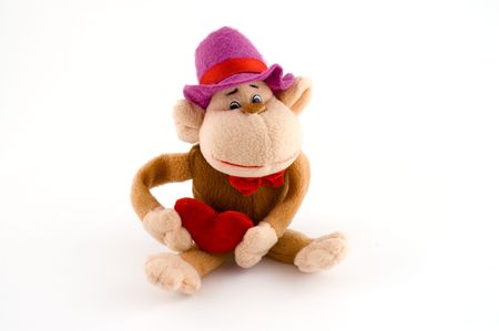Cute mascot  monkey with heart on isolated white backgorund made from soft polarの写真素材