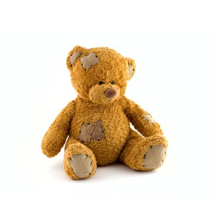 Cute teddy bear at isolated white backgroundの写真素材