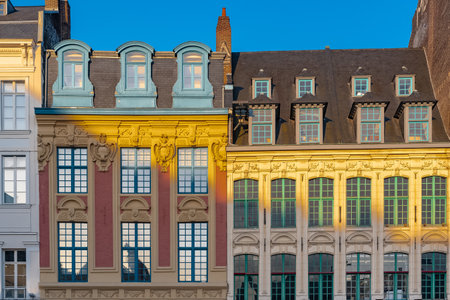 Lille, ancient houses in the center, and the belfry of the Chambre de Commerceのeditorial素材