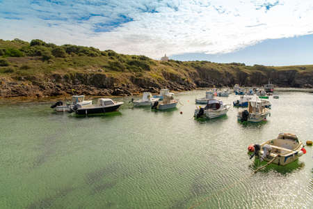 Yeu island in France, beautiful landscape, the harbor and the chapel in backgroundの写真素材