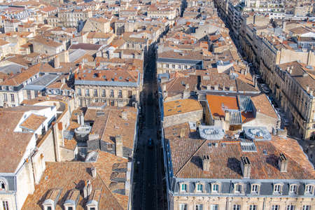 Bordeaux, beautiful french city, aerial view of tiles roofsの写真素材