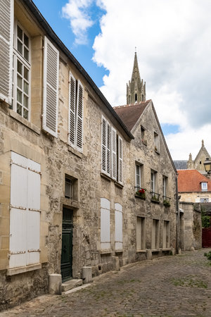 Senlis, medieval city in France, typical street with ancient housesの写真素材