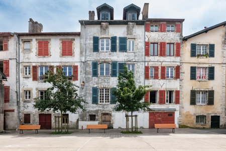 Bayonne in the pays Basque, typical facades with colorful shutters in the historic centerのeditorial素材