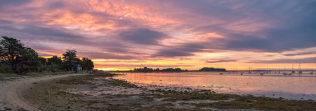 Brittany, Ile dâArz in the Morbihan gulf, seascape of the coast, sunsetの写真素材