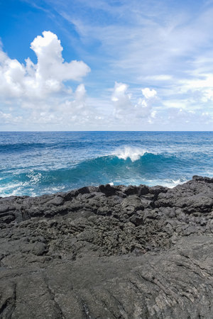 La Reunion, the volcanic garden, landscape at Saint-Philippe, cliff formed by ancient lava on the seaの写真素材