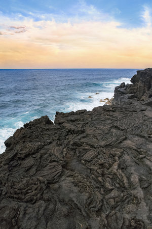 La Reunion, the volcanic garden, landscape at Saint-Philippe, cliff formed by ancient lava on the seaの写真素材