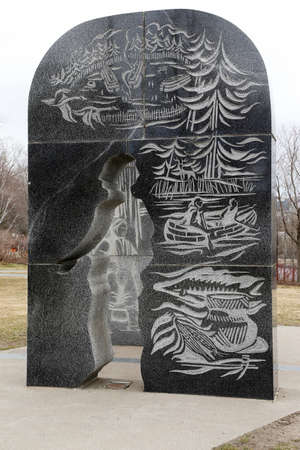 Quebec, Canada -12-02-2021: commemorative monument representing Jacques Cartier and Grand Chief Donnacona de StadaconÃ© at Cartier-BrÃ©beuf National Historic Site of Canada in Quebec Cityのeditorial素材