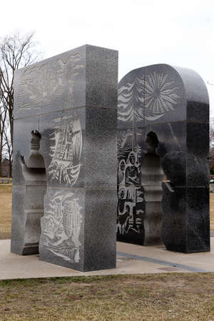 Quebec, Canada -12-02-2021: commemorative monument representing Jacques Cartier and Grand Chief Donnacona de StadaconÃ© at Cartier-BrÃ©beuf National Historic Site of Canada in Quebec Cityのeditorial素材