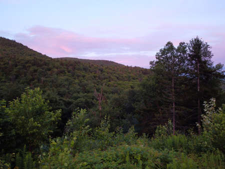 view of a sunset on the mountainの写真素材