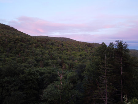 view of a sunset on the mountainの写真素材
