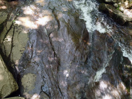a waterfall in the forestの写真素材