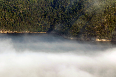 Fog on the Saguenay Fjordの写真素材