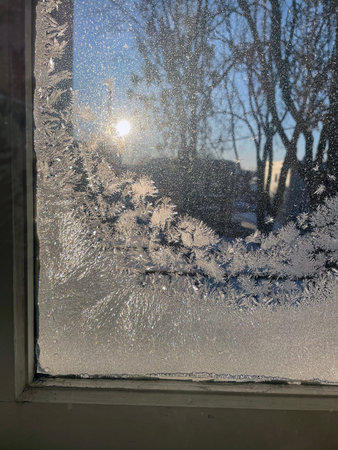 the window of an apartment in winterの写真素材