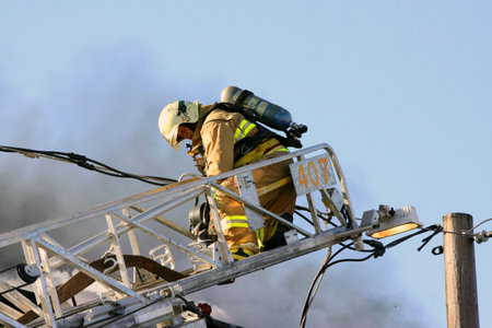 Firefighters at work during a fire in a buildingのeditorial素材