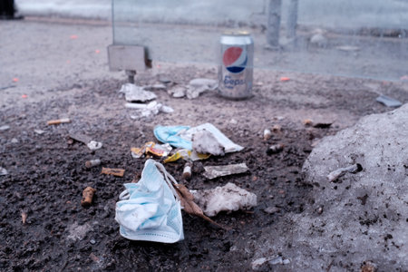 Surgical mask used on the floor during the Covid-19 pandemic