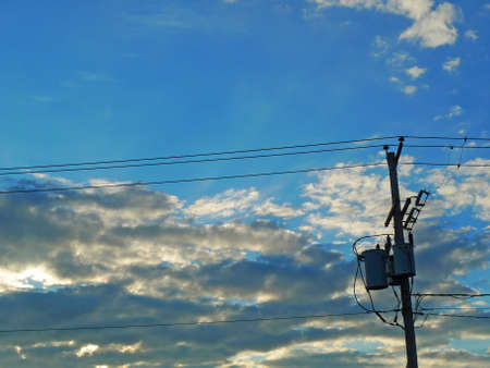 An electric pole in townの写真素材