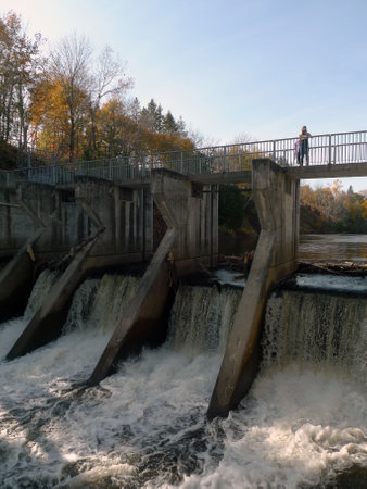 a hydroelectric dam on the Saint-Charles River at Chauveau Park in Quebecのeditorial素材