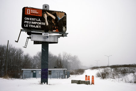 Traffic sign on a snowy road in the Quebec city. The road is closed.のeditorial素材