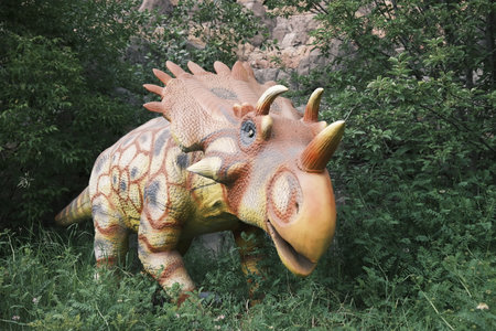 Dinosaur in the park, close-up of a dinosaur.の写真素材