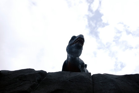 Reconstruction of a dinosaur in the forest at the Calgary Zooの写真素材
