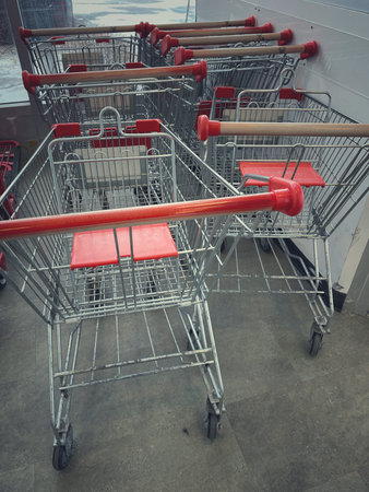 Empty shopping carts in the shopping center. Shallow depth of field