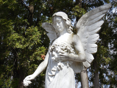 Sculpture of an angel in a park in Quebec, Canadaの写真素材