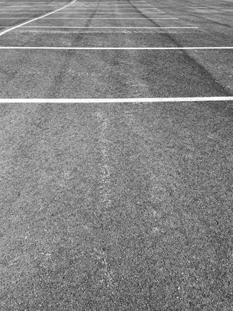 White line on the asphalt of the parking lotの写真素材