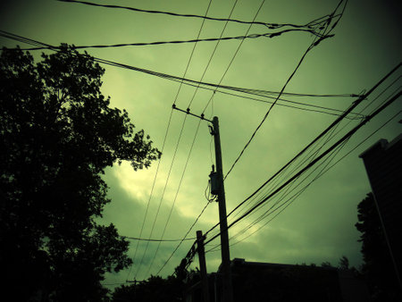 electrical wires on a city streetの写真素材