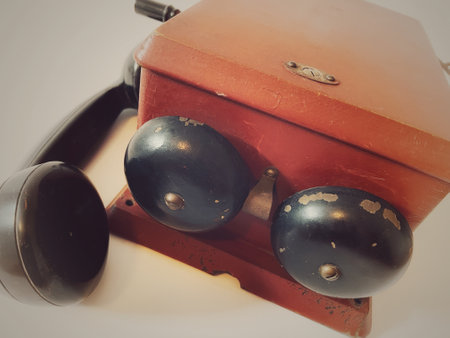 Vintage telephone with retro filter effect, shallow depth of field.の写真素材